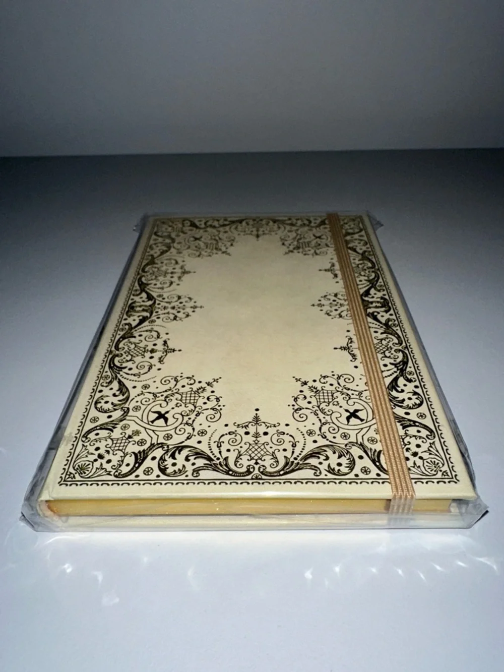 Gilded Ivory gold-foiled embossed cover gilded pages elastic closure journal